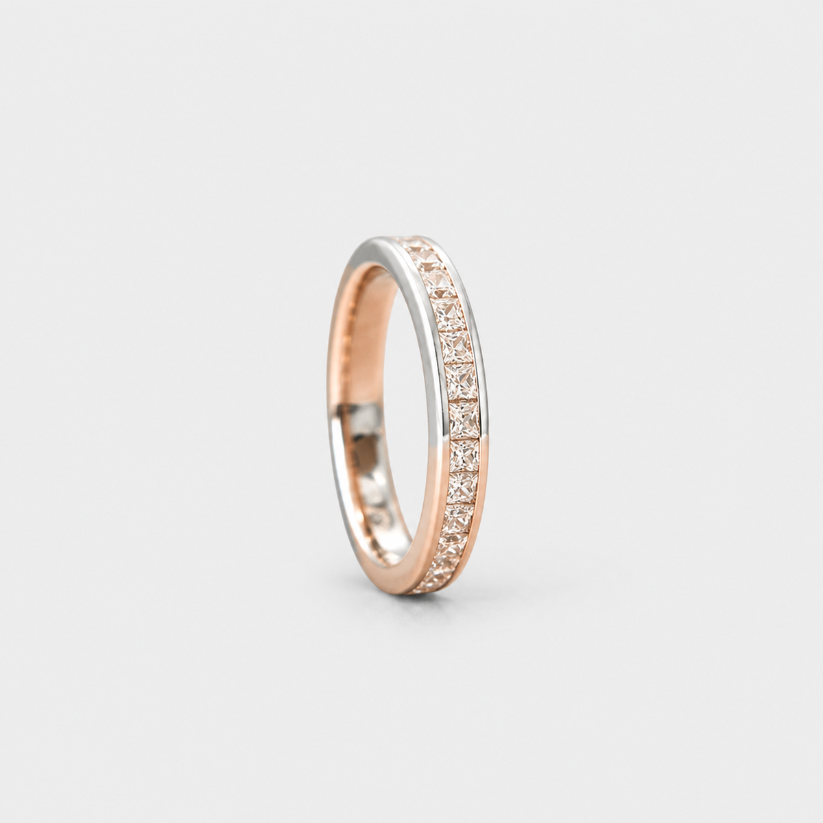 Princess Channel Eternity Band on light gray studio background