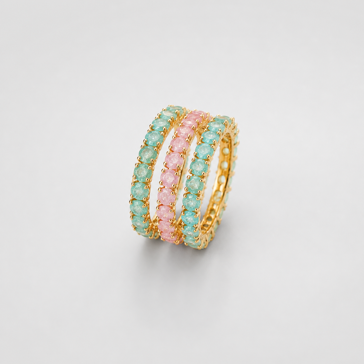Aqua Crystal Eternity Statement Ring on light gray studio background