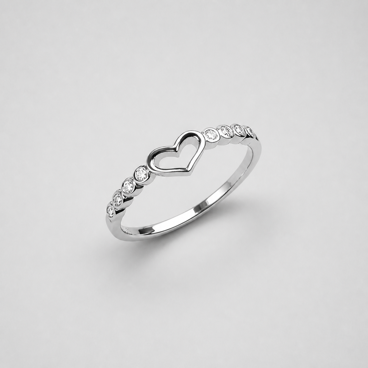 Open Heart Crystals Accent Ring on light gray studio background