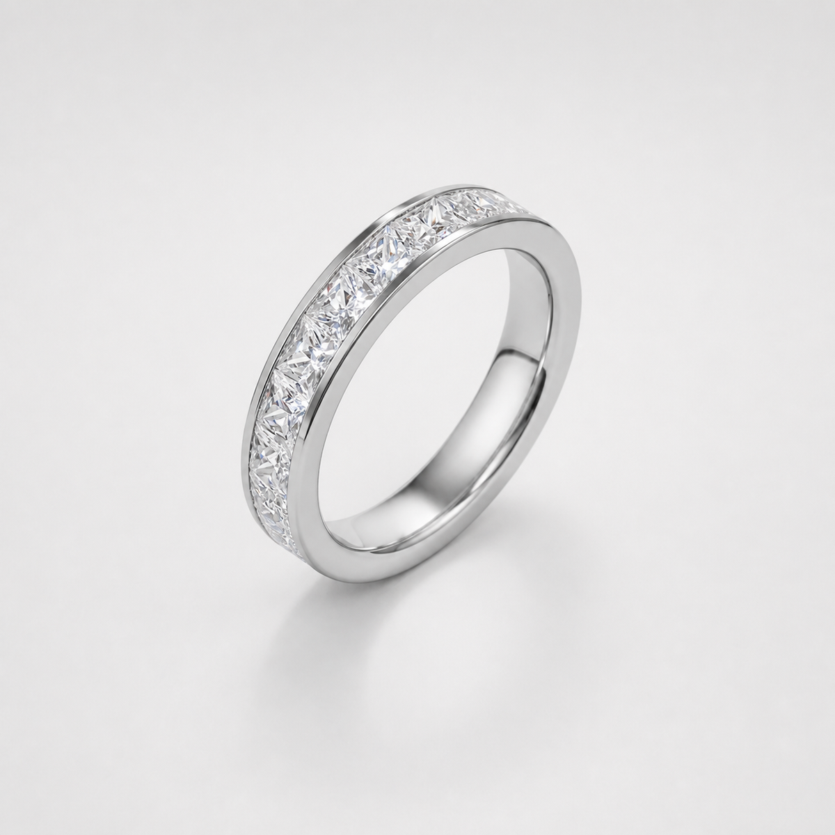 Princess Titanium Eternity Band on light gray studio background