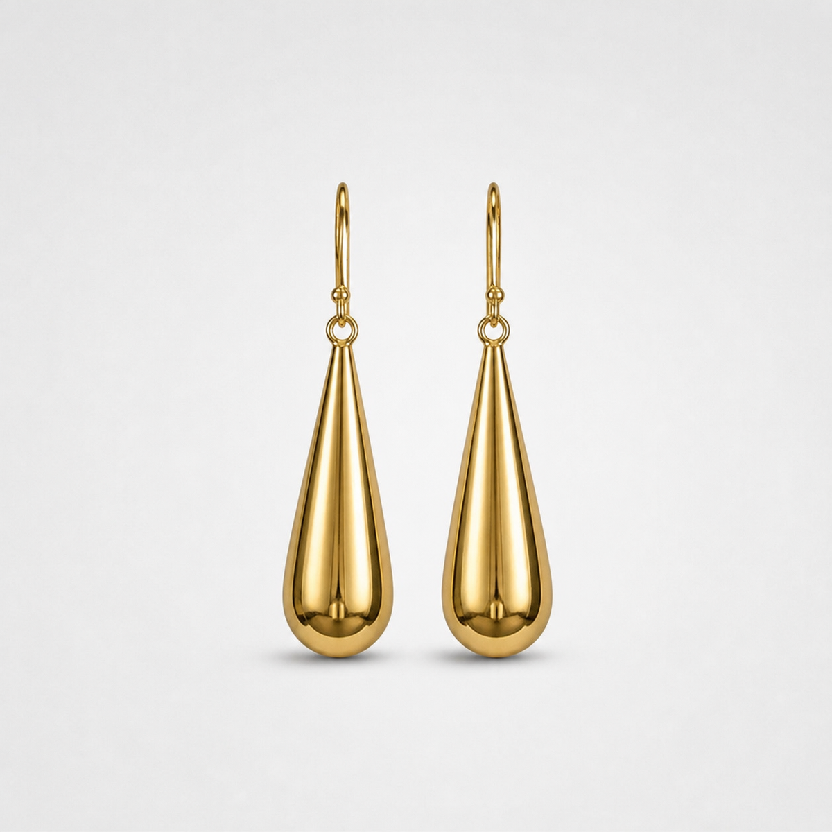 Long Teardrop Earrings left and right pair on light gray background