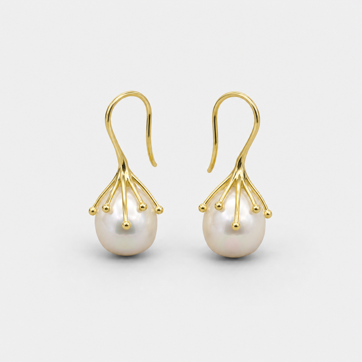 Gold Pearl Blossom Drop Earrings left and right pair on light gray background
