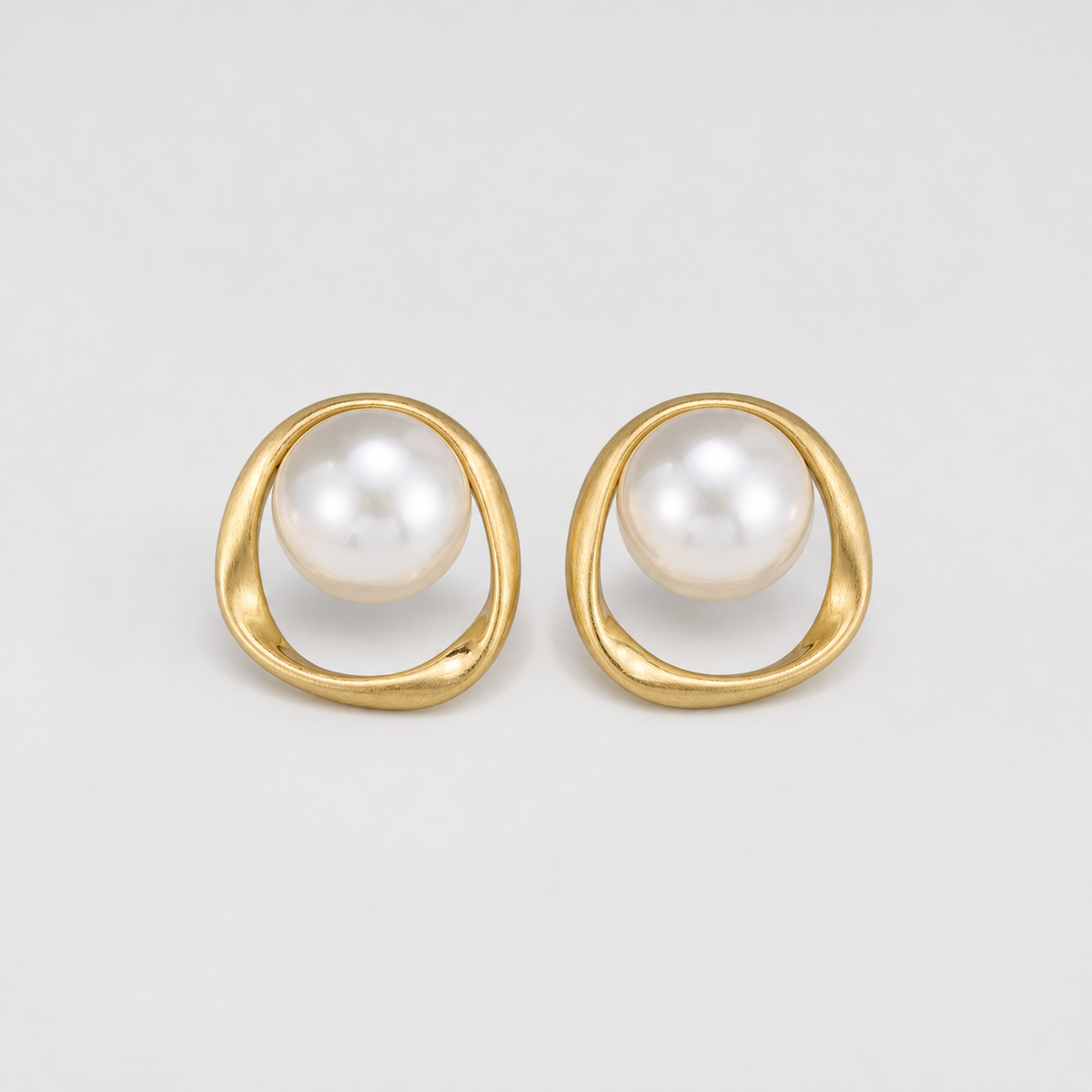 Organic Halo Pearl Stud Earrings left and right pair on light gray background