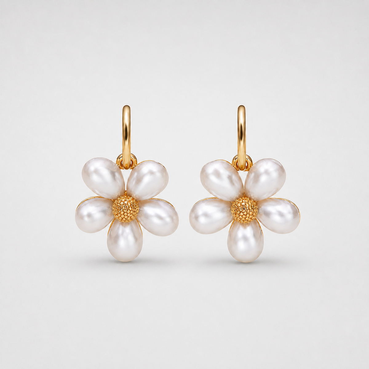 Pearl Petal Daisy Drop Earrings left and right pair on light gray background