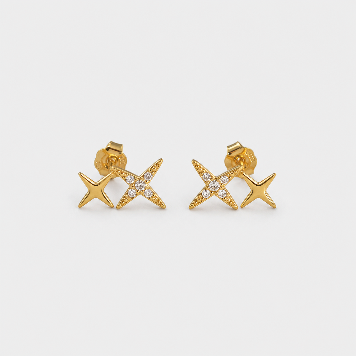 Crystal Double Star Stud Earrings left and right pair on light gray background