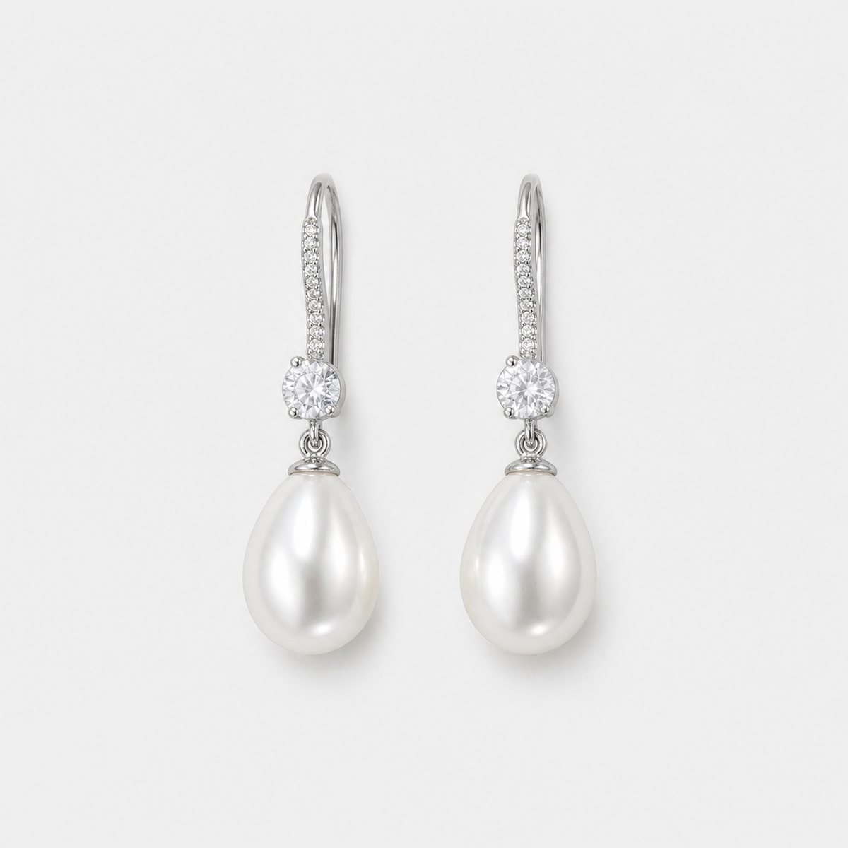 Teardrop Pearl Crystal Drop Earrings left and right pair on light gray background