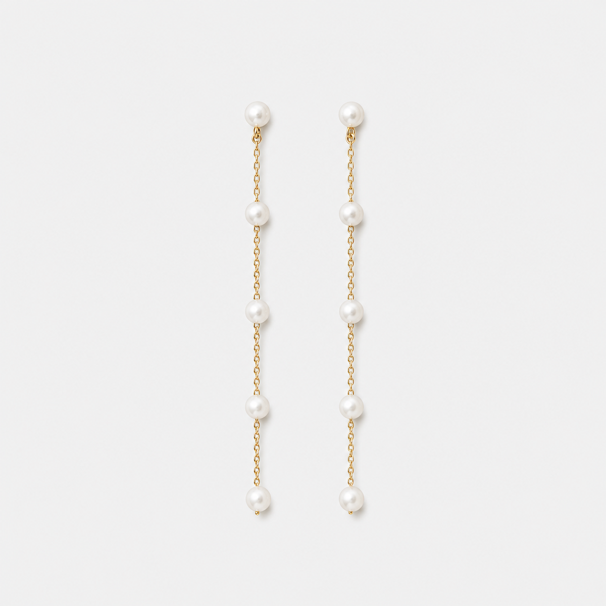Pearl Station Chain Drop Earrings left and right pair on light gray background