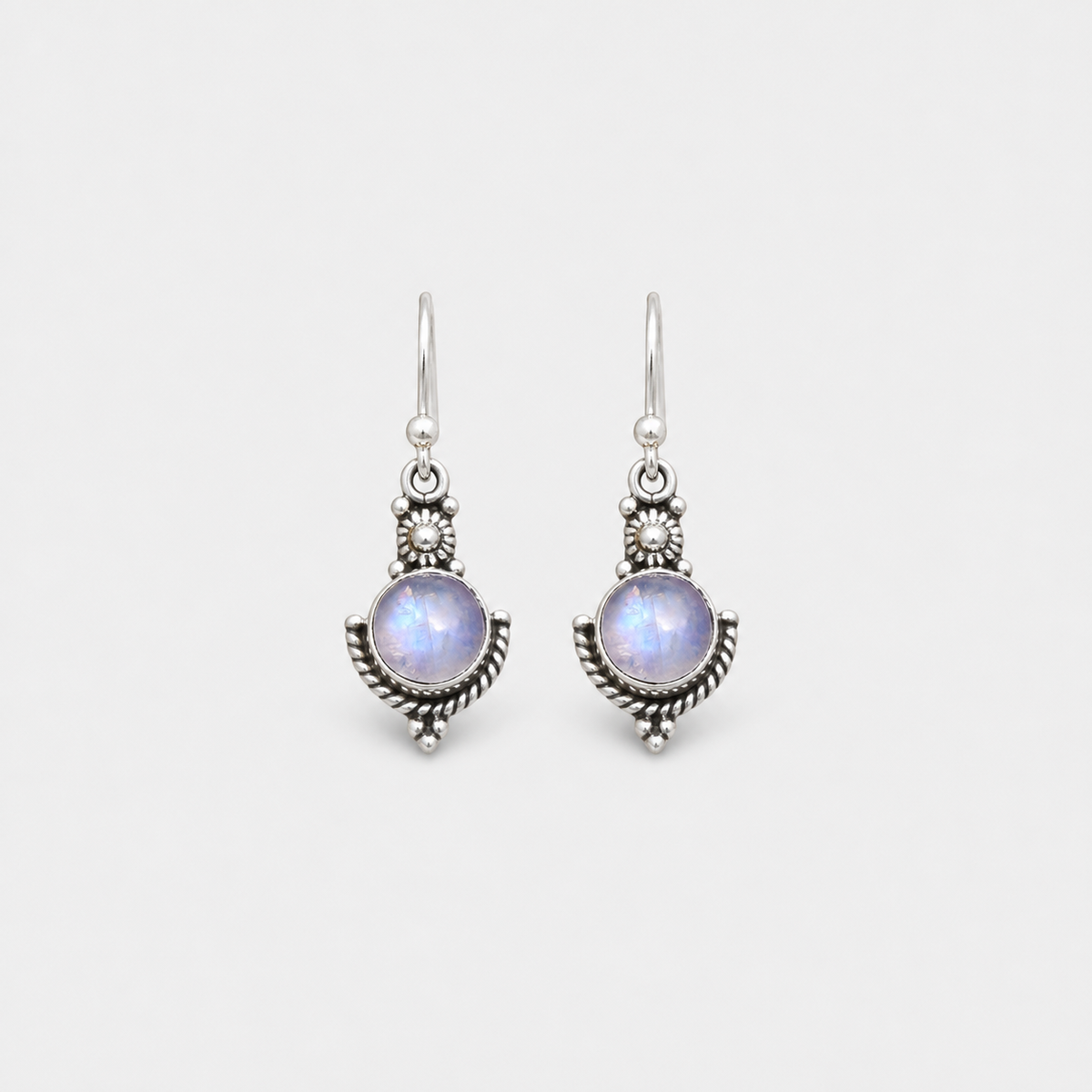 Vintage Moonstone Earrings left and right pair on light gray background