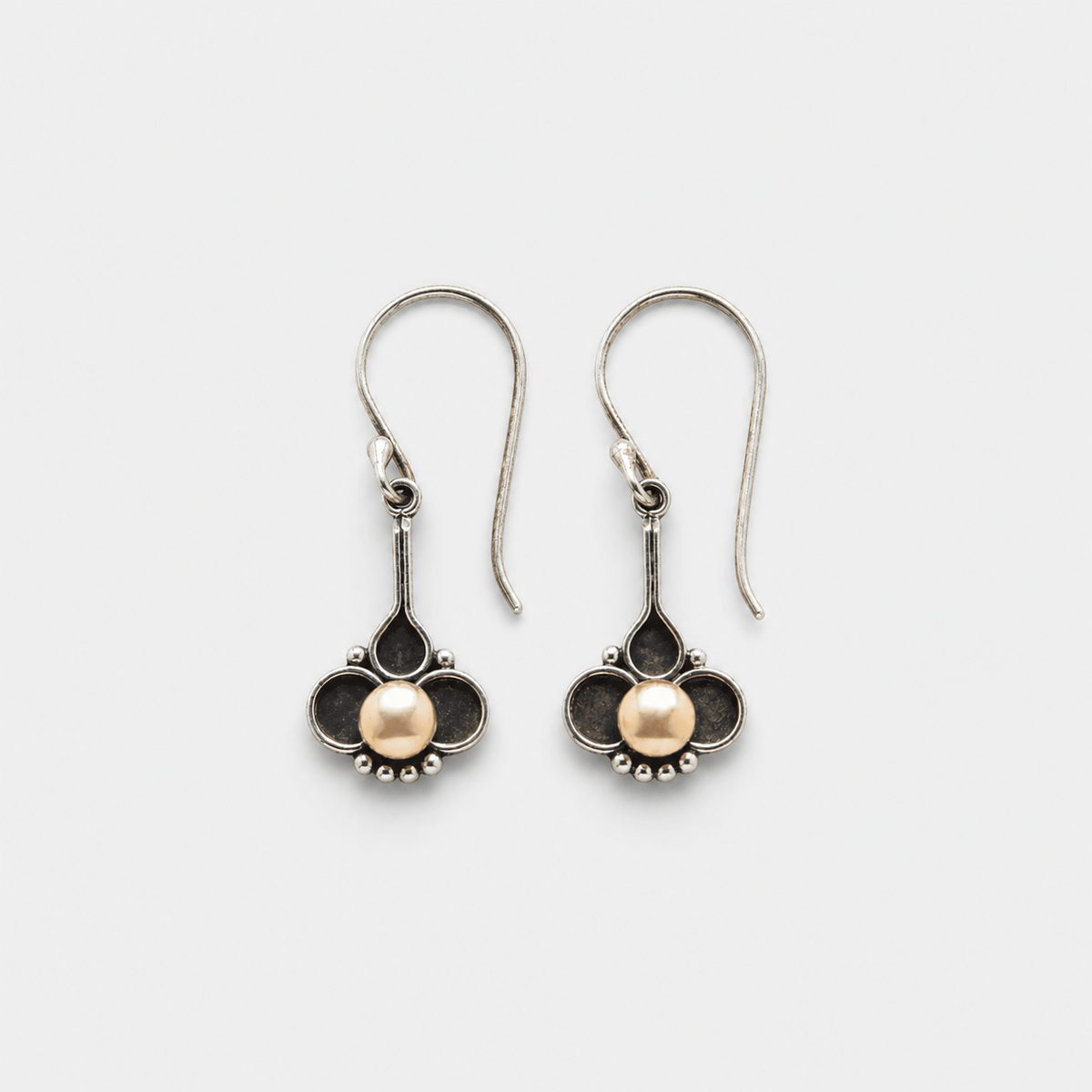 Boho Clover Pearl Silver Earrings left and right pair on light gray background