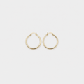 Bold Gold Hoop Earrings left and right pair on light gray background