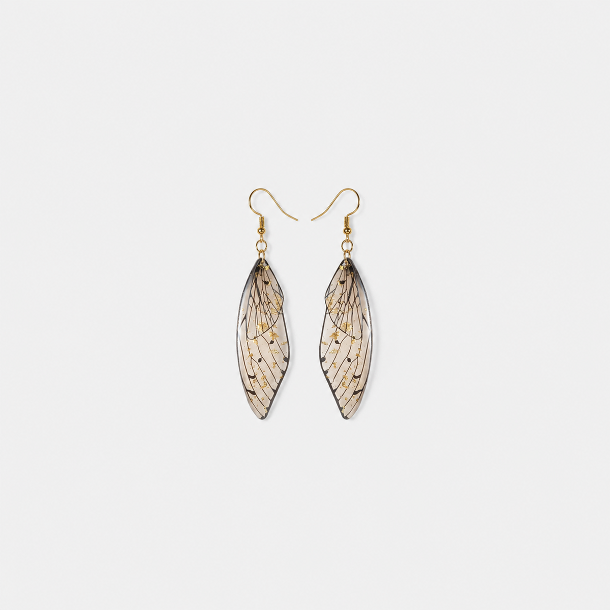 Butterfly Wing Resin Drop Earrings — left and right pair on light gray background