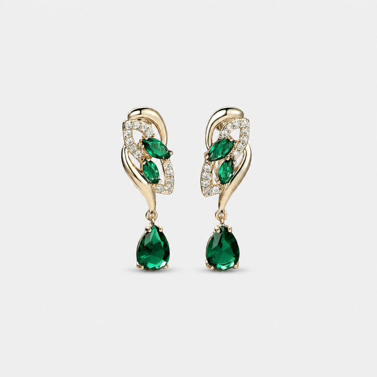 Velvet Flame Emerald Earrings — left and right pair on light gray background