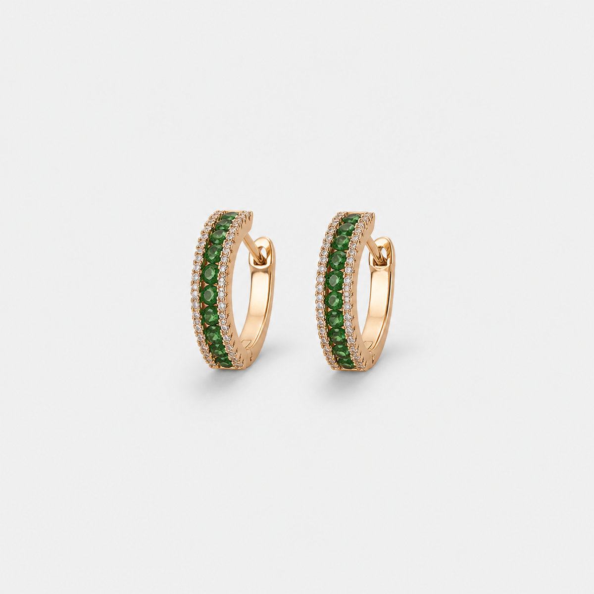 Elegant Emerald Glow Earrings — left and right pair on light gray background