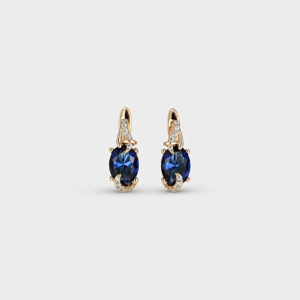 Royal Midnight Gold Drop Earrings — left and right pair on light gray background