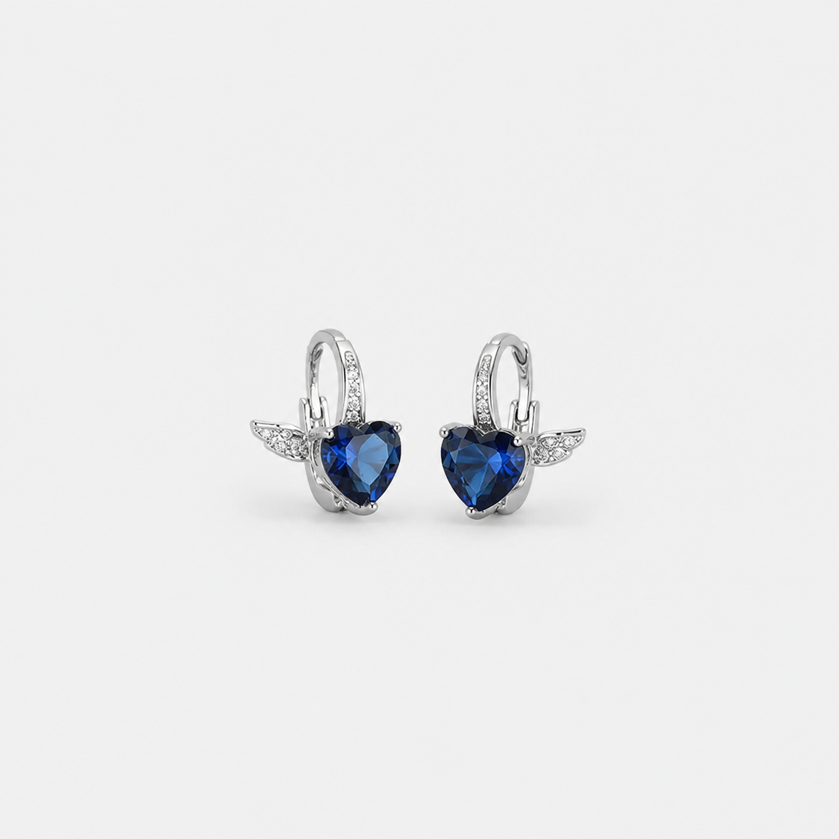 Lunara Moon Inspired Cerestelle Earrings — left and right pair on light gray background