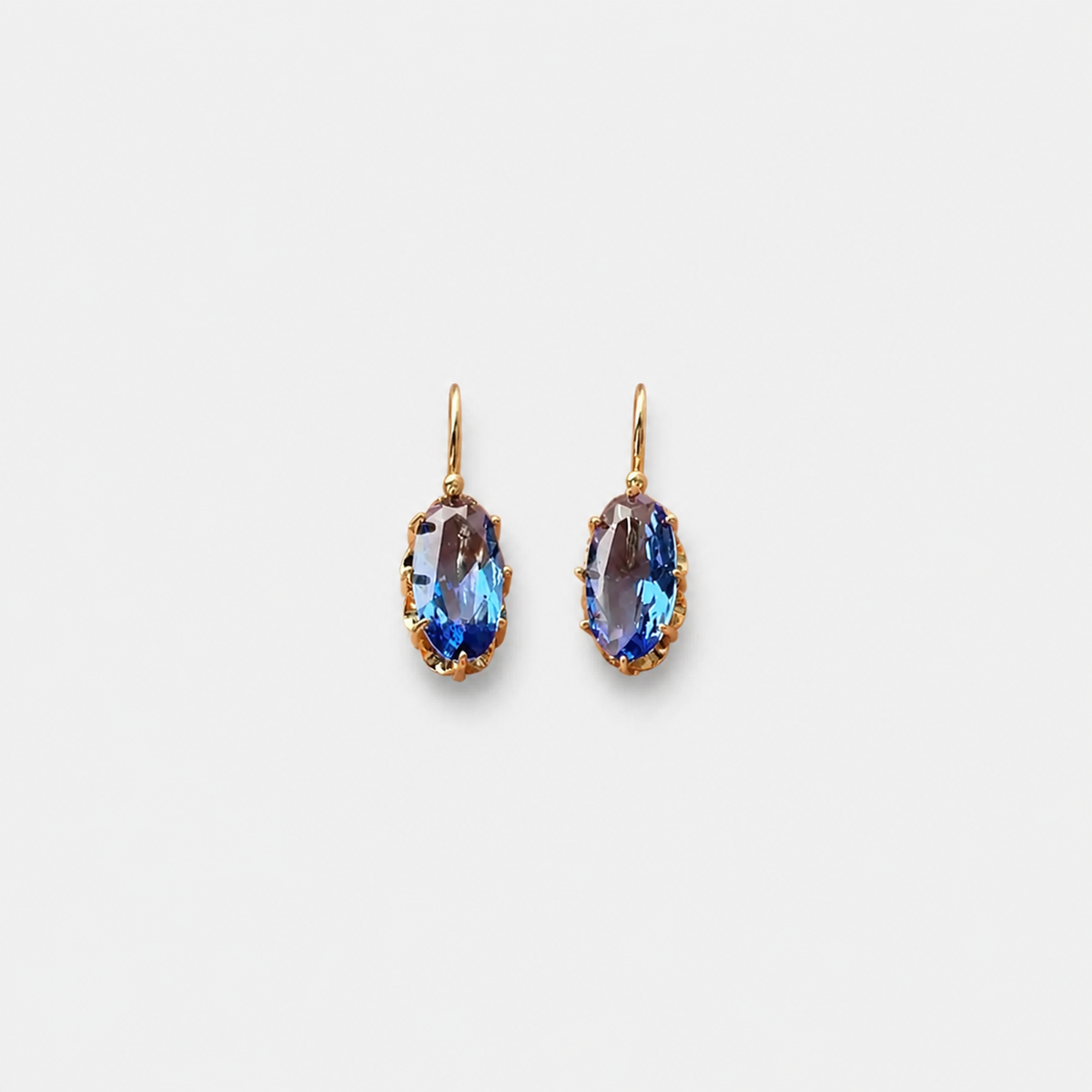 Golden Blue Bloom Gold Earrings — left and right pair on light gray background