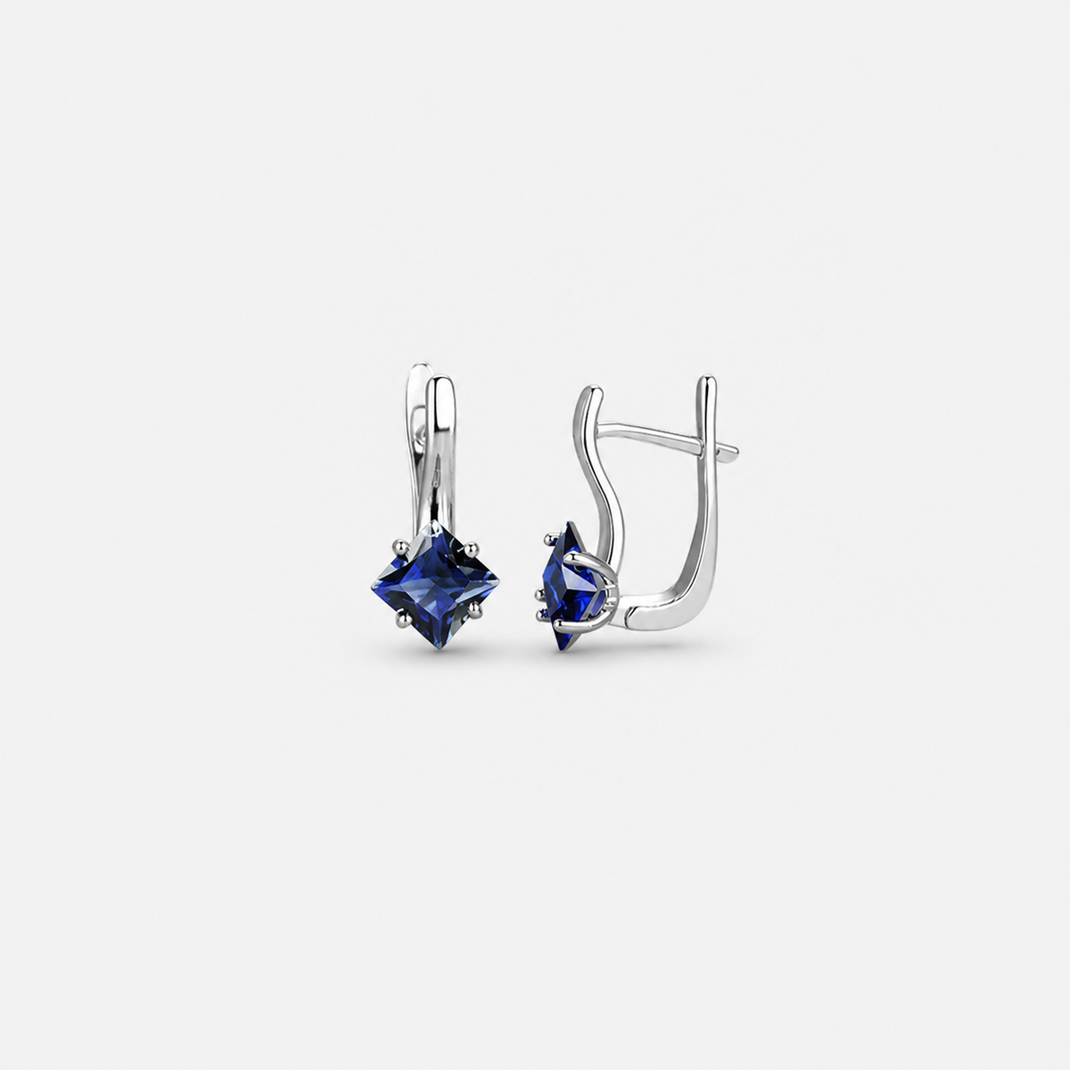 Sylvette Azurienne Elegant Earrings — left and right pair on light gray background