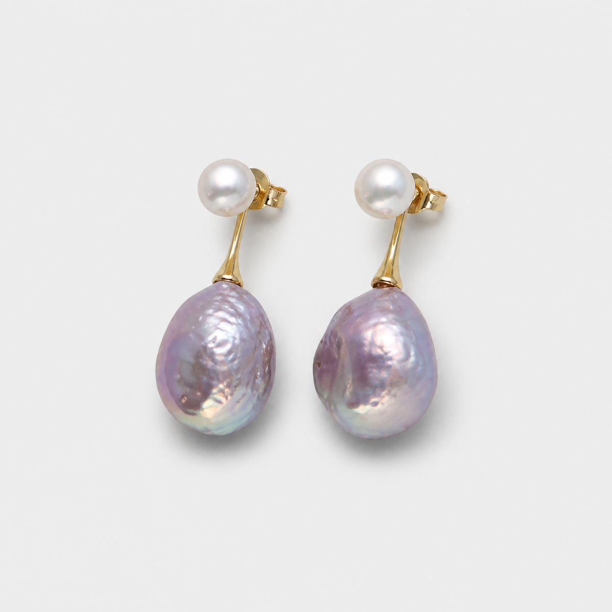 Elegant Lilac Pearl Earrings — left and right pair on light gray background