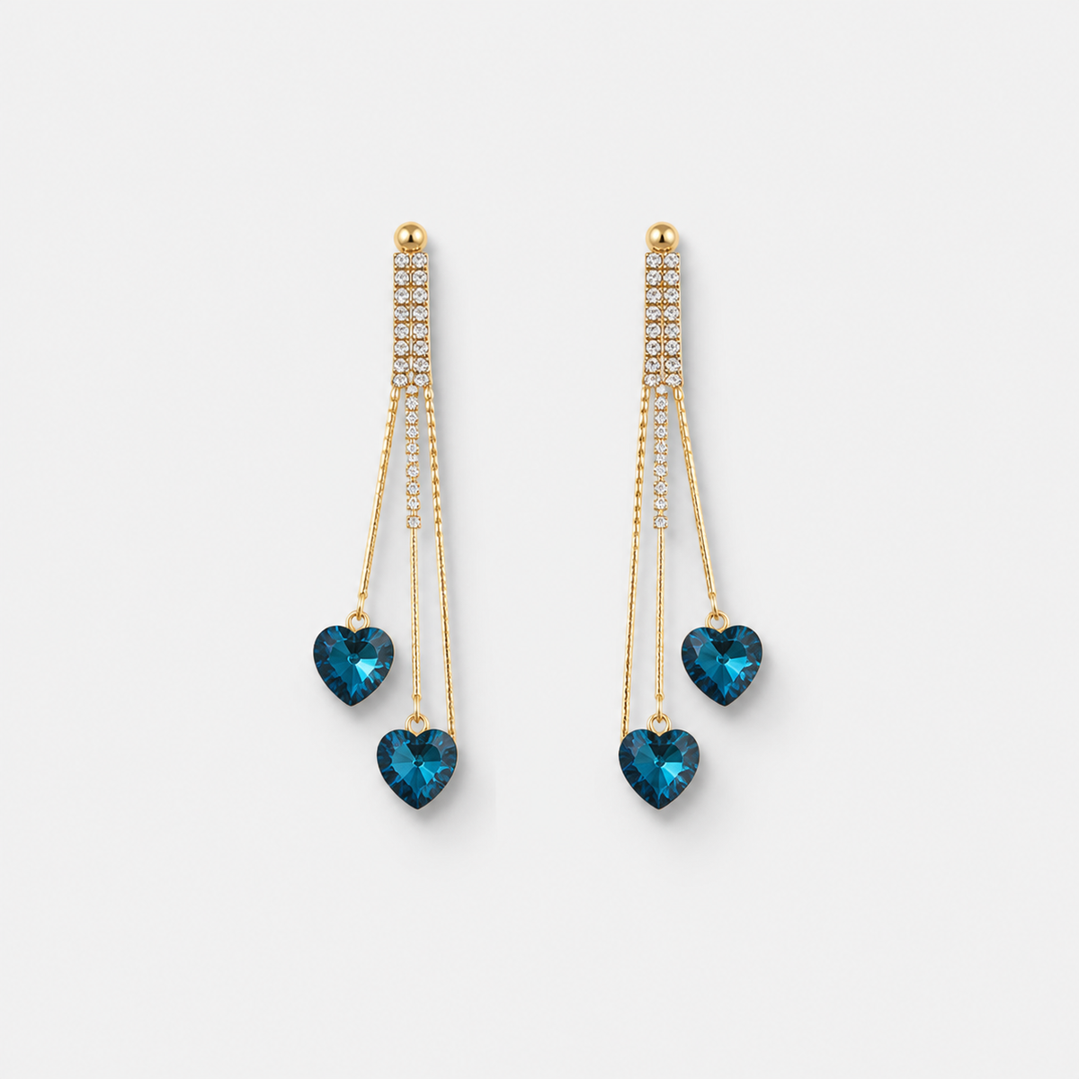 Elegant Blue Crystal Heart Rain Earrings — left and right pair on light gray background