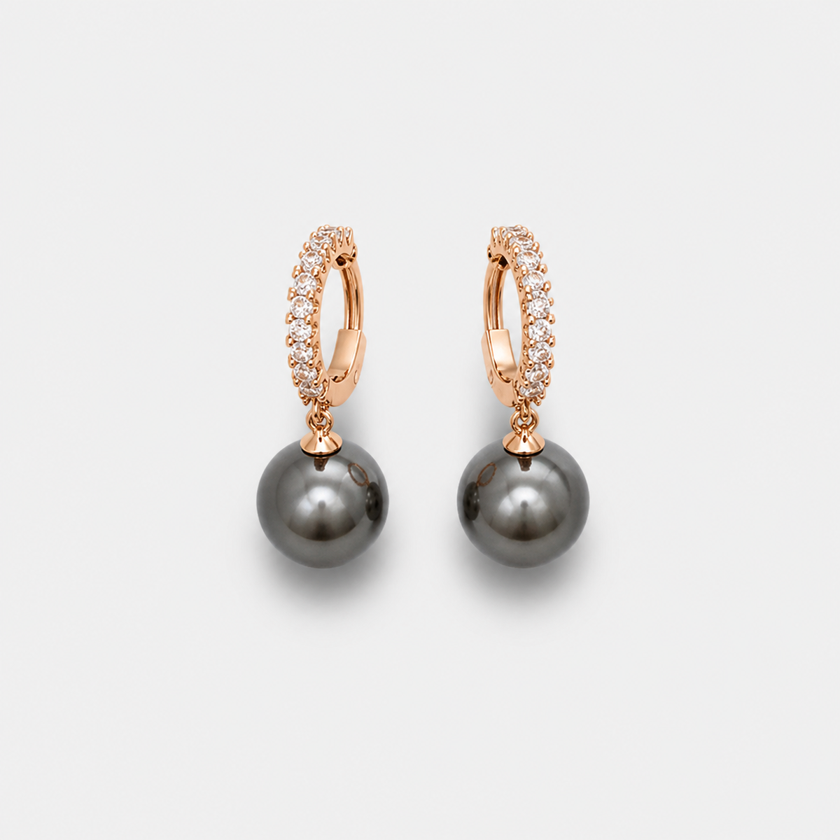 Luxury Pearl and Zirconia Earrings — left and right pair on light gray background