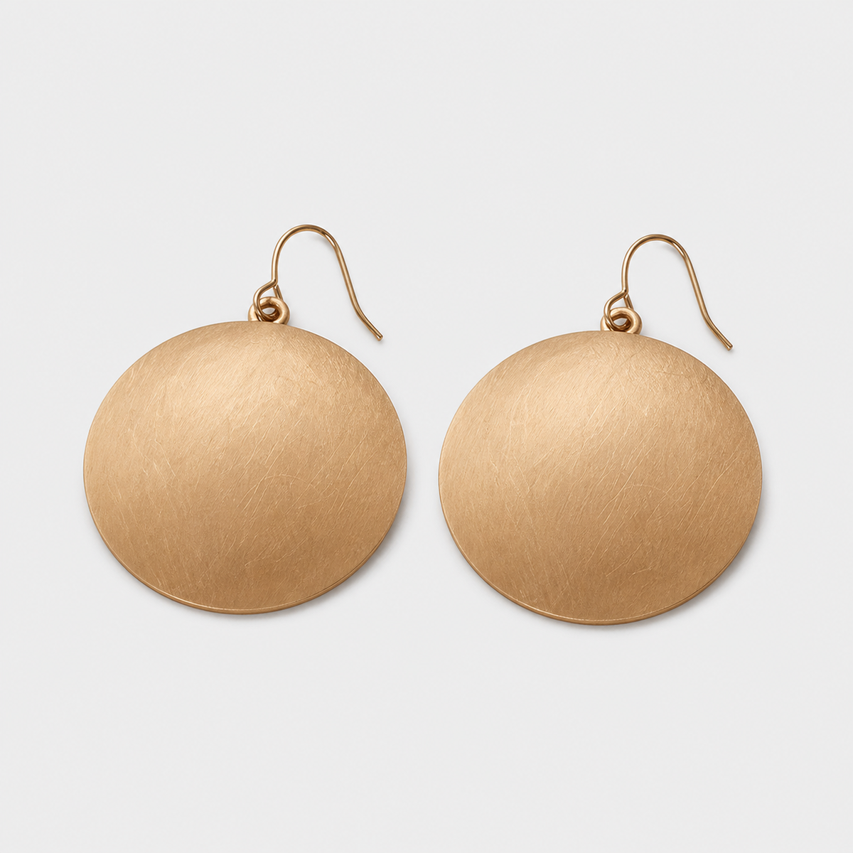 Retro Gold Record Earrings – pair on light gray background