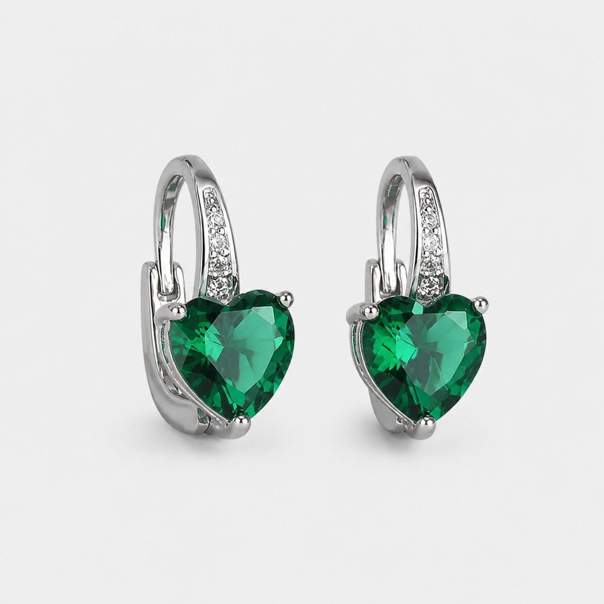 Emerald Heart Drop Earrings – pair on light gray background