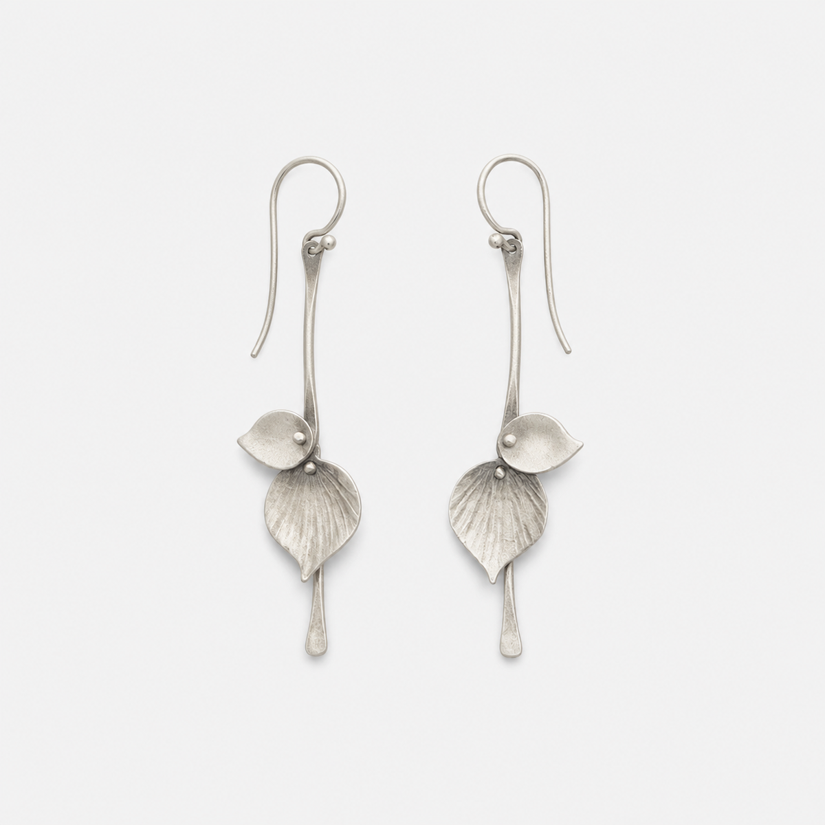 Silver Leaf Vintage Earrings – pair on light gray background