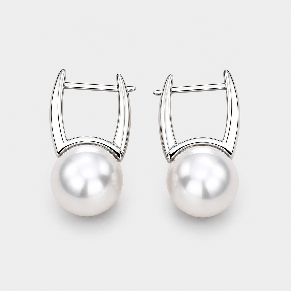 Vintage Golden Pearl Earrings – pair on light gray background