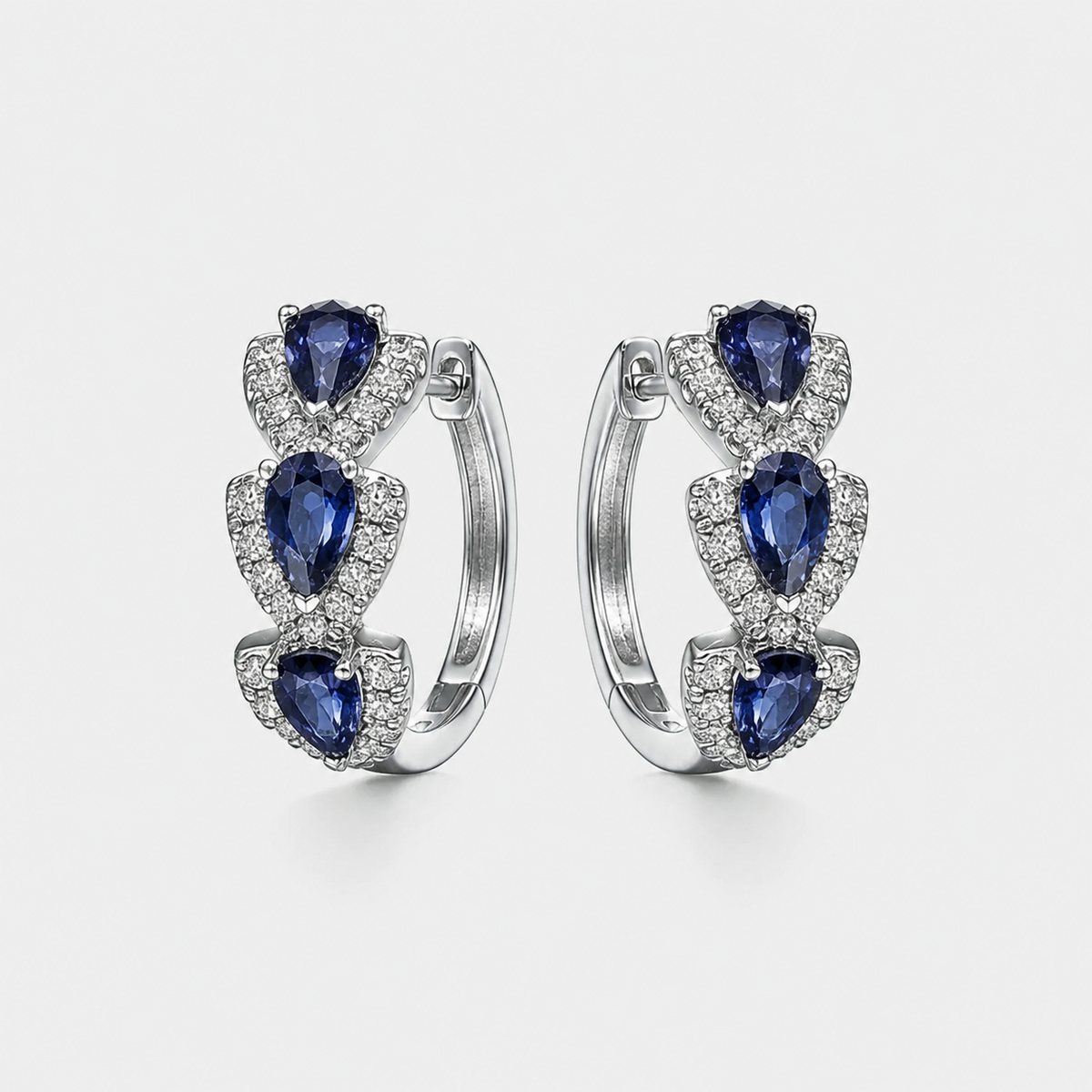 Royal Sapphire Crest Earrings – pair on light gray background