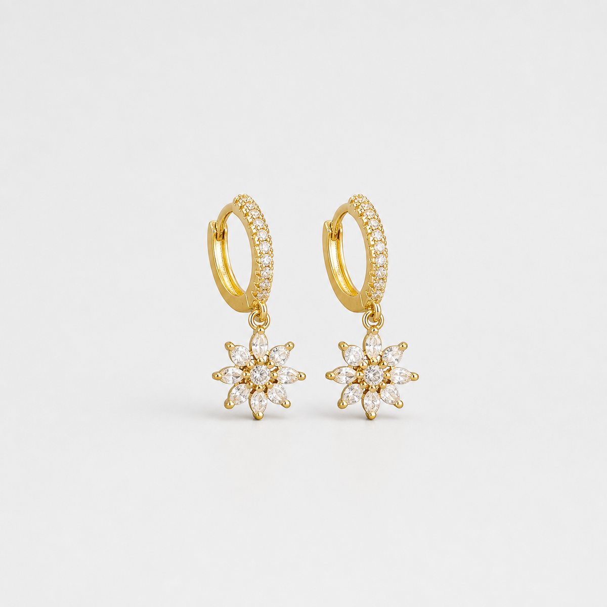 Classic Crystal Snowflake Drop Earrings left and right pair on light gray background