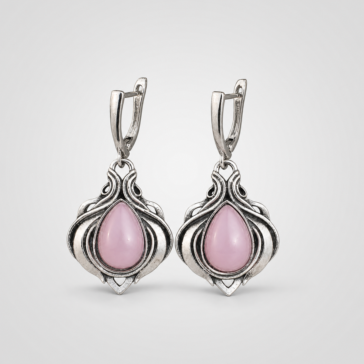 Vintage Victorian Style Water Droplet Inlaid with Pink Stones Earrings left and right pair on light gray background