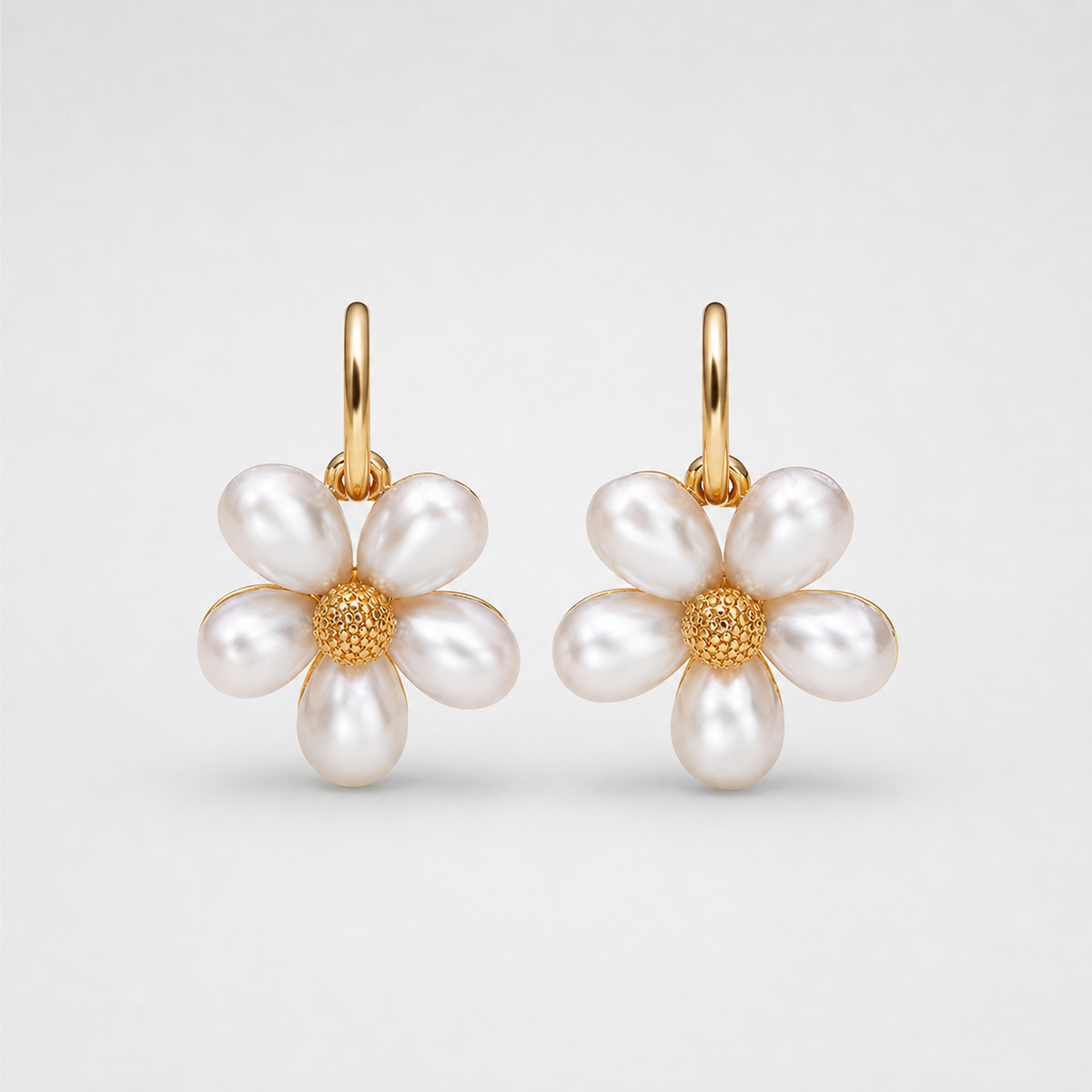 Pearl Petal Daisy Drop Earrings left and right pair on light gray background