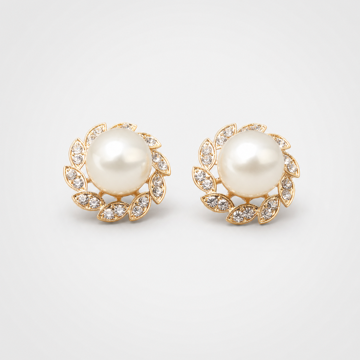 Exquisite Pearl and Shiny Leaves Earrings left and right pair on light gray background