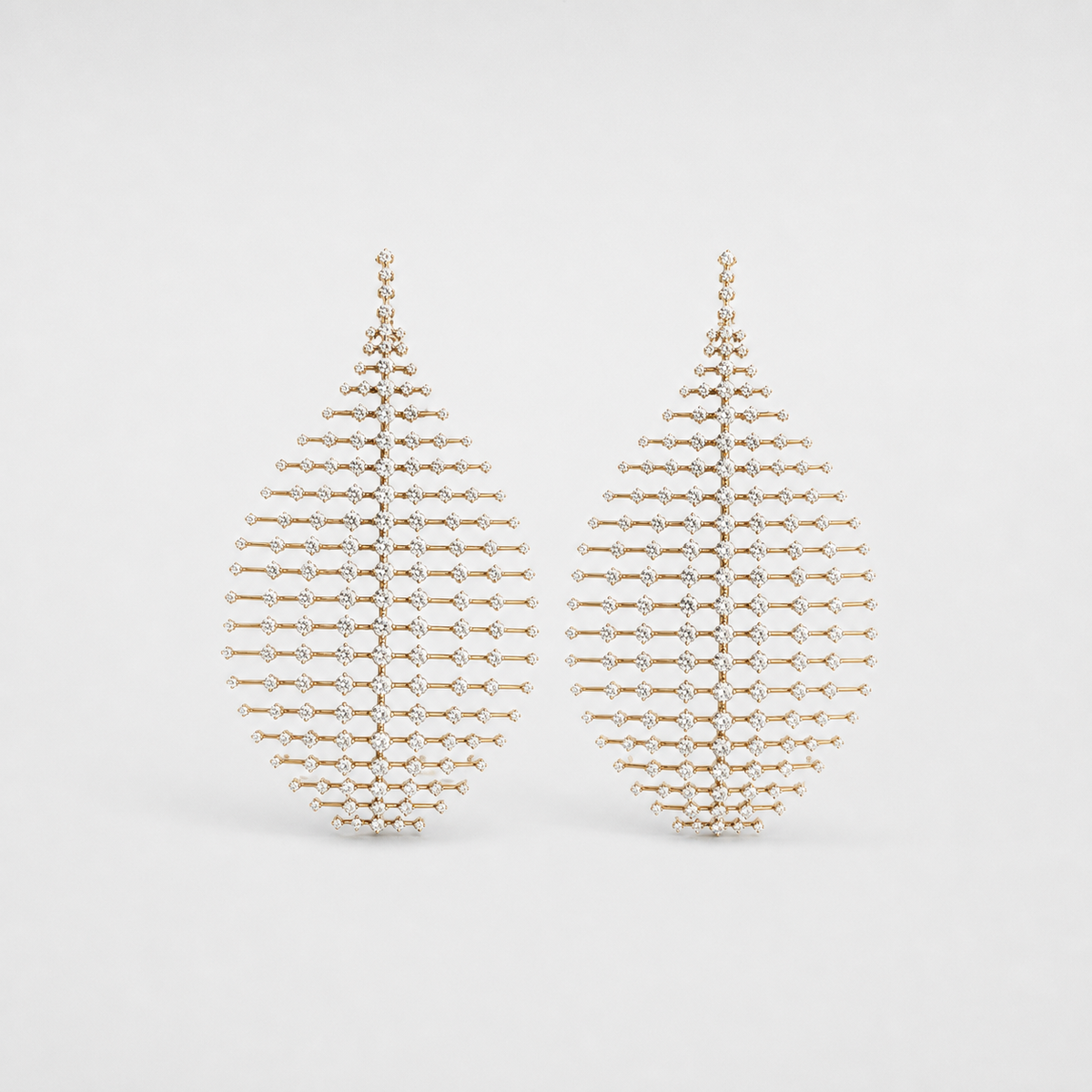 Vintage Zirconia Globe Earrings left and right pair on light gray background