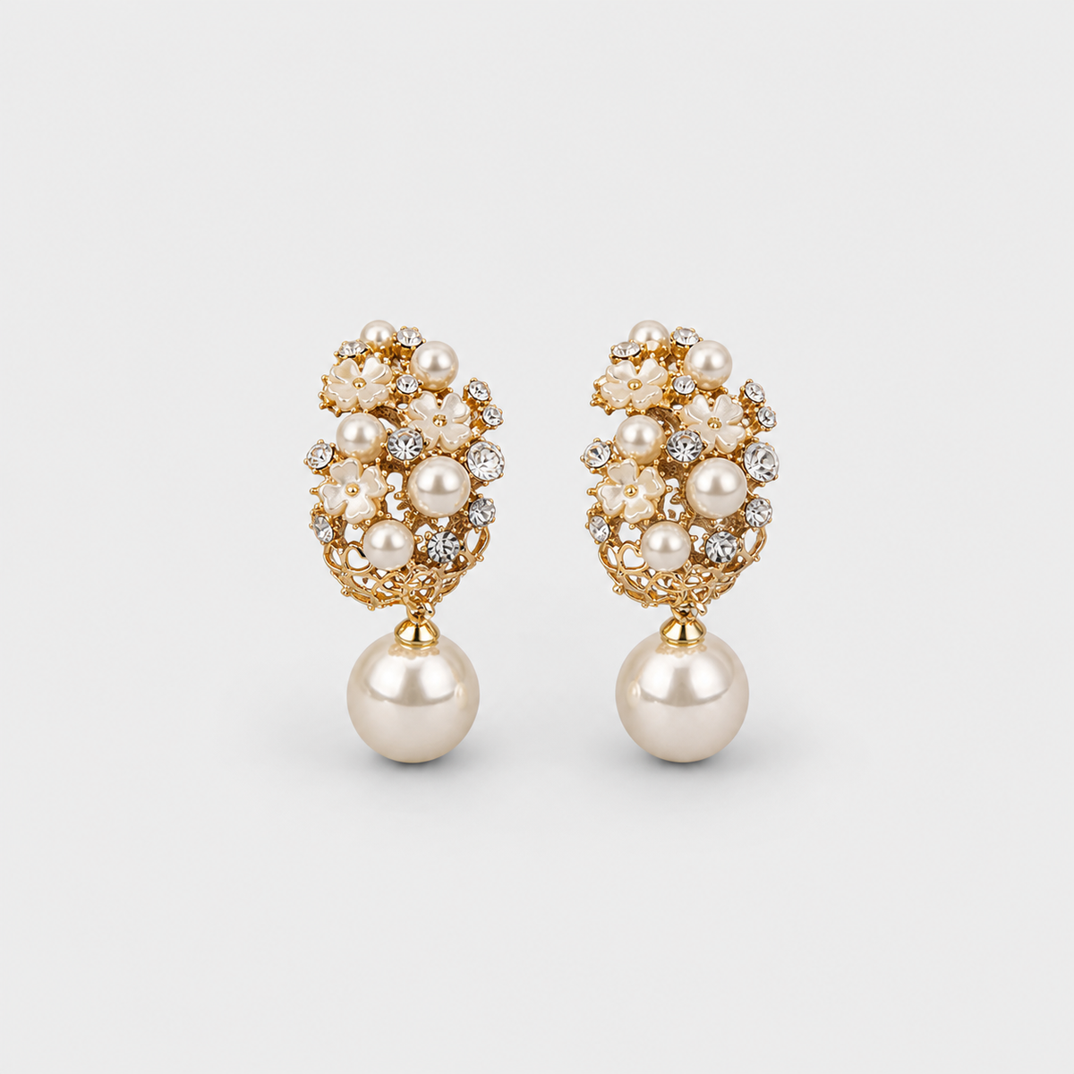Elegant Flower Pearl Earrings left and right pair on light gray background