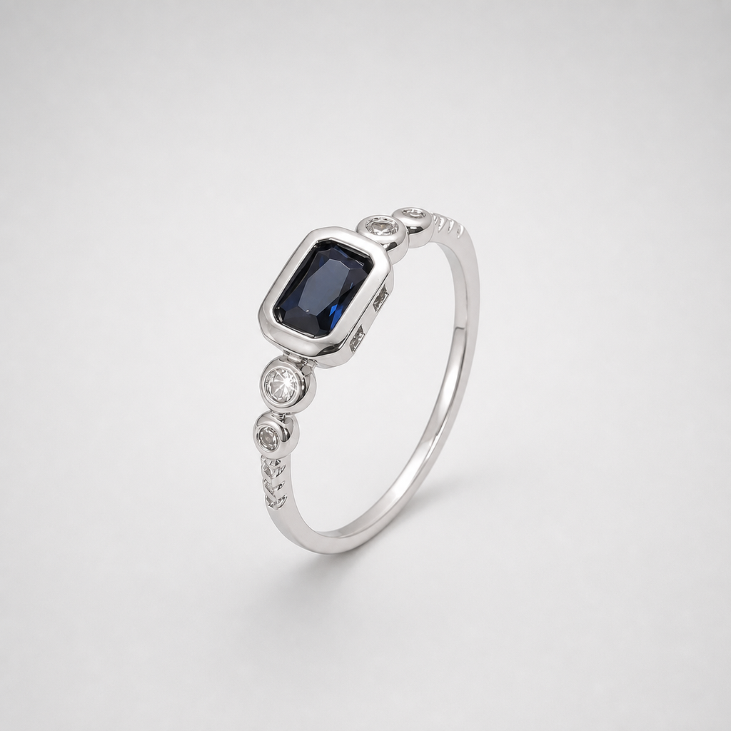 Windsor White Gold Sapphire Ring on light gray studio background