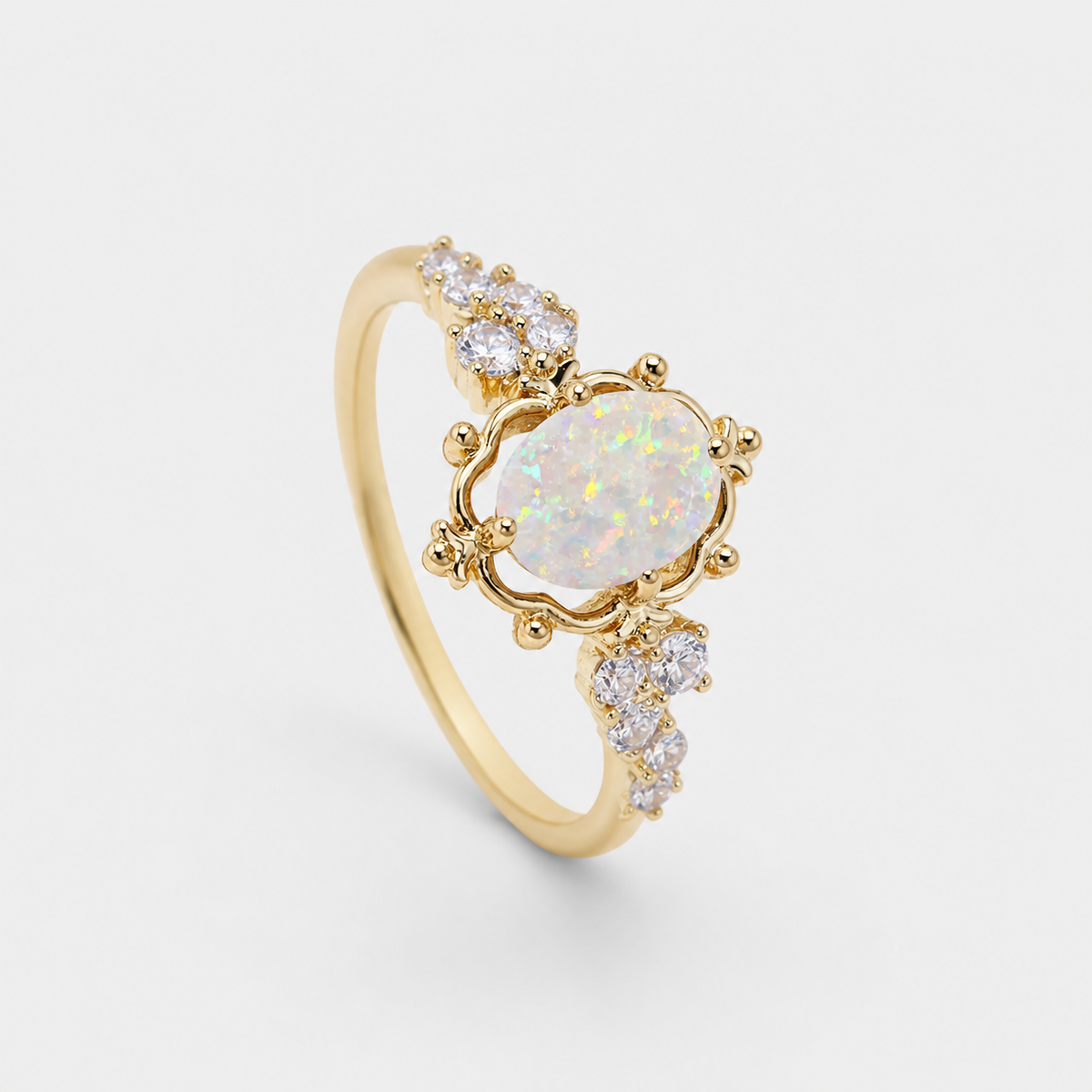 White Fire Opal Oval Stone Flower Ring on light gray background