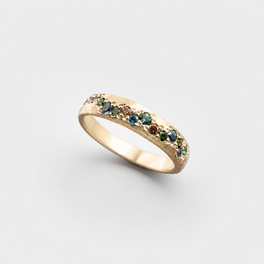 Vintage Gold Bunter Ring on light gray background